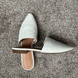 A new day white mules, size 8, great condition, hardly worn
